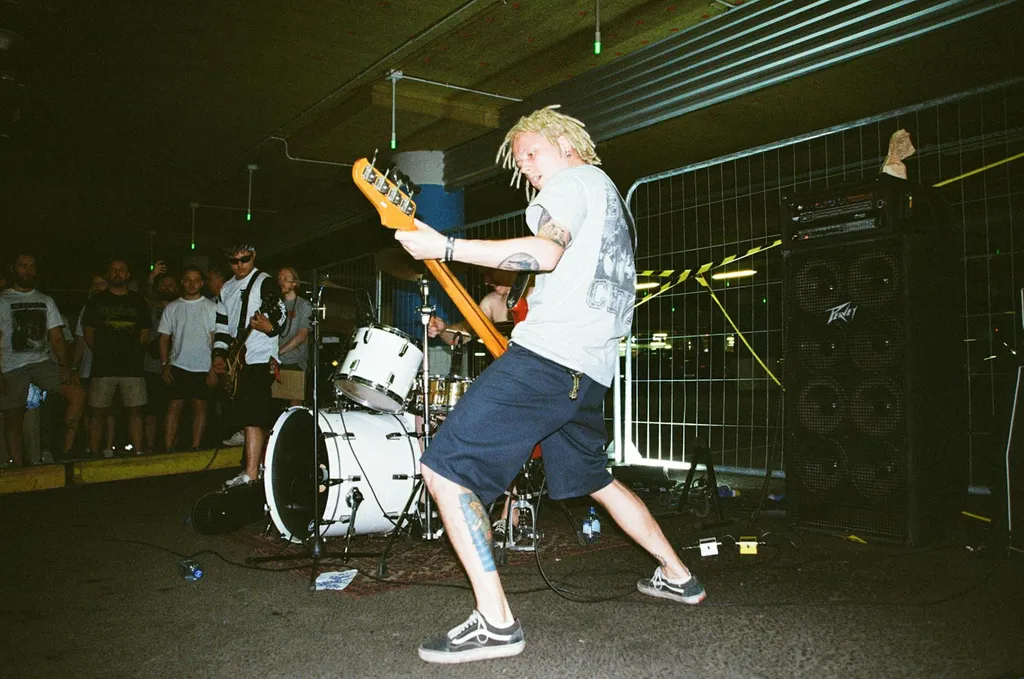 90s-punk-band-monorchid-performing-energetically-on-stage