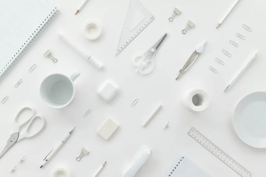 photorealistic-scene-compass-and-sharp-scissors-on-paper